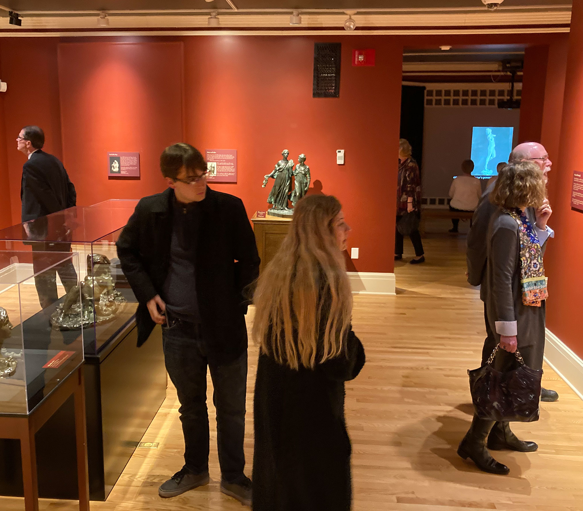 Visitors in an exhibit of Helen Farnsworth Mears