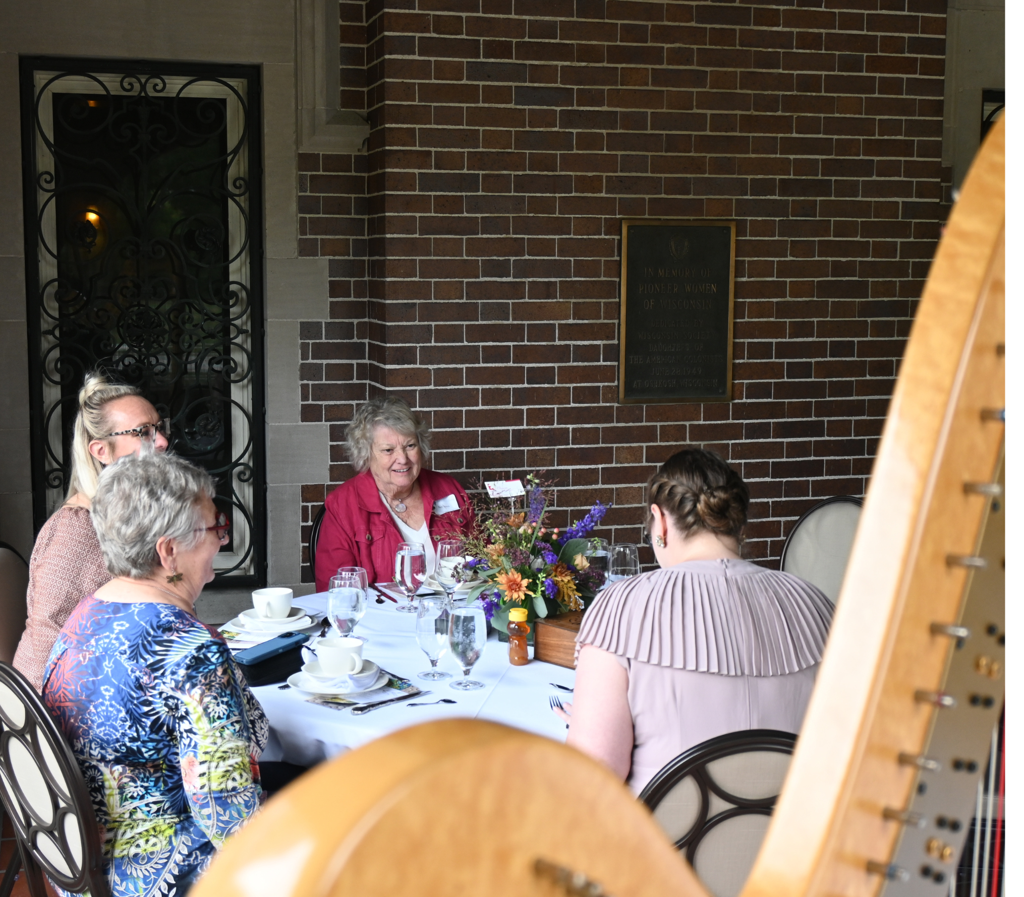 A gathering held on the Historic Sawyer Home porch